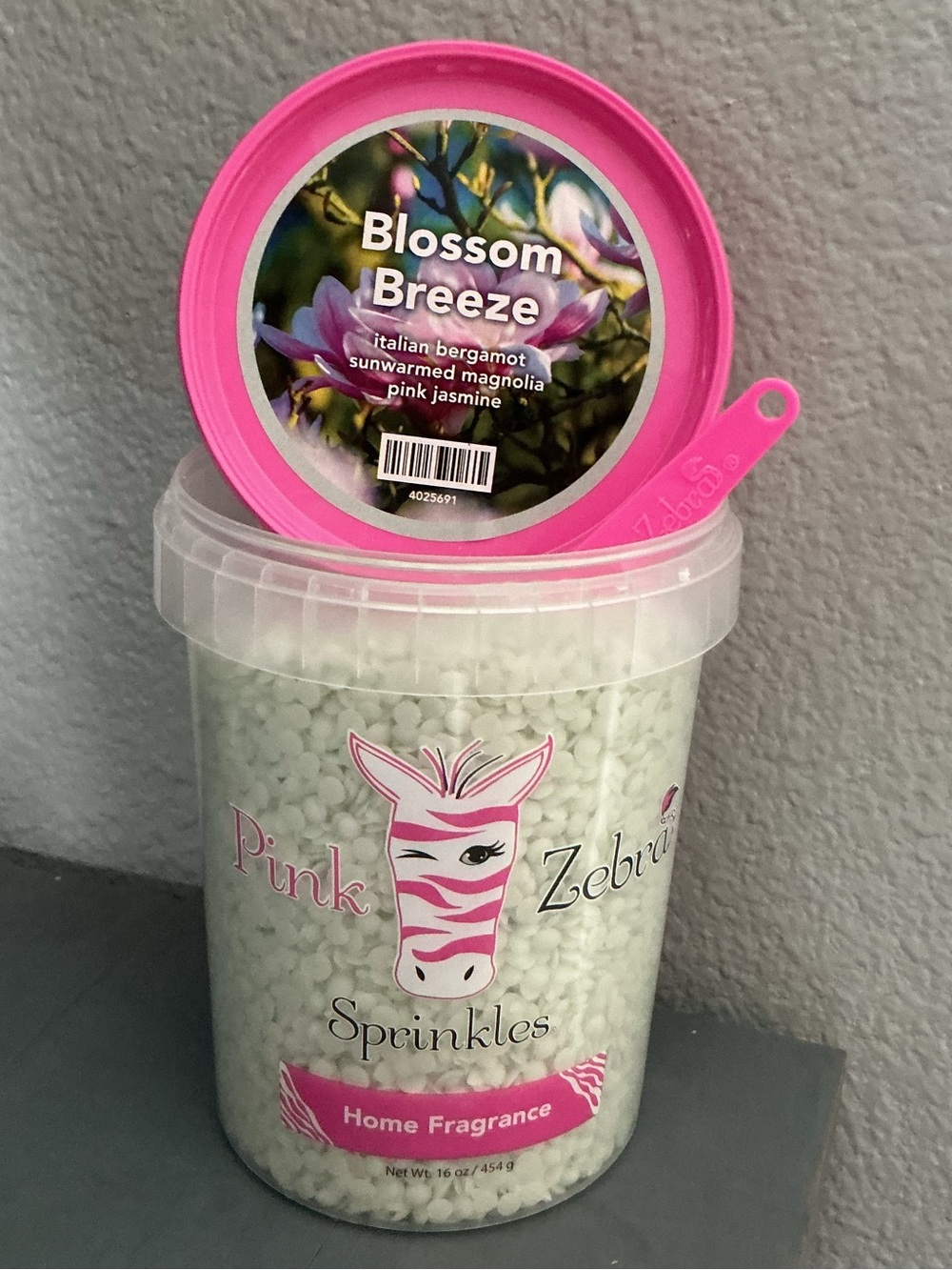 Blossom Breeze Pink Zebra Wax Melts in a 4 oz blend bag